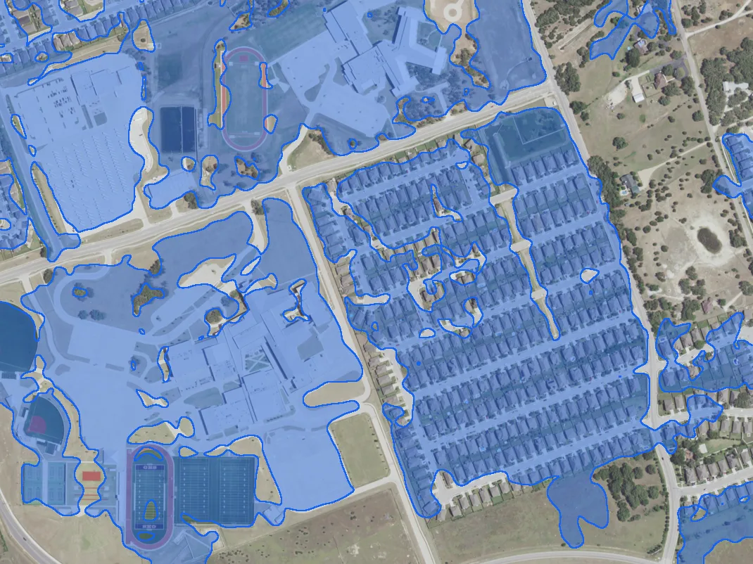 Aerial view of Leander, Texas, in 2022 with everything built since 2012 marked in blue
